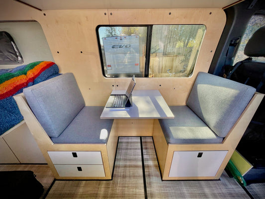 Camper van conversion with dinette seating
